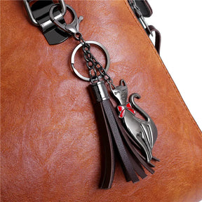 Kit Premium em Couro Nobre - Bolsa + Carteira + Carteira de Mão + Necessaire de Brinde